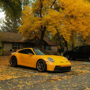 Porsche 992 GT3 in Signal Yellow during fall