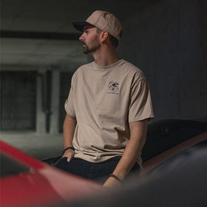 TTC Mascot shirt on a male in a parking garage